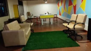 A photograph of a dining room in a coliving pg.