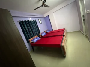Photograph of 2-sharing bedroom in a coliving pg.