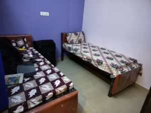 Photograph of 2-sharing bedroom in a coliving pg.