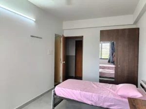 Photograph of a double sharing room in a coliving pg.