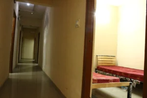 A photograph of a corridor in a coliving PG.