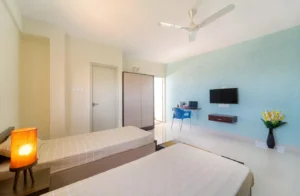 Photograph of a double sharing room in a coliving PG in Bannerghatta