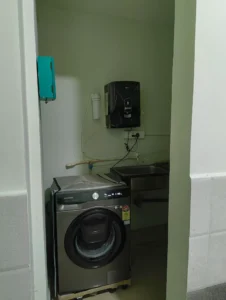 Photo of a washing machine in a coliving pg in Bannerghatta.